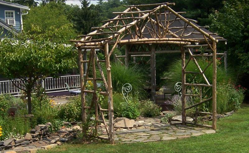 Rustic wedding arbor at Blue Stone Cottage Bed Breakfast High Falls NY
